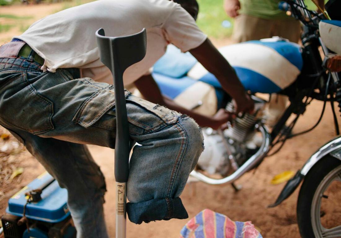 Hugo, a former child soldier, is now a trusted mechanic