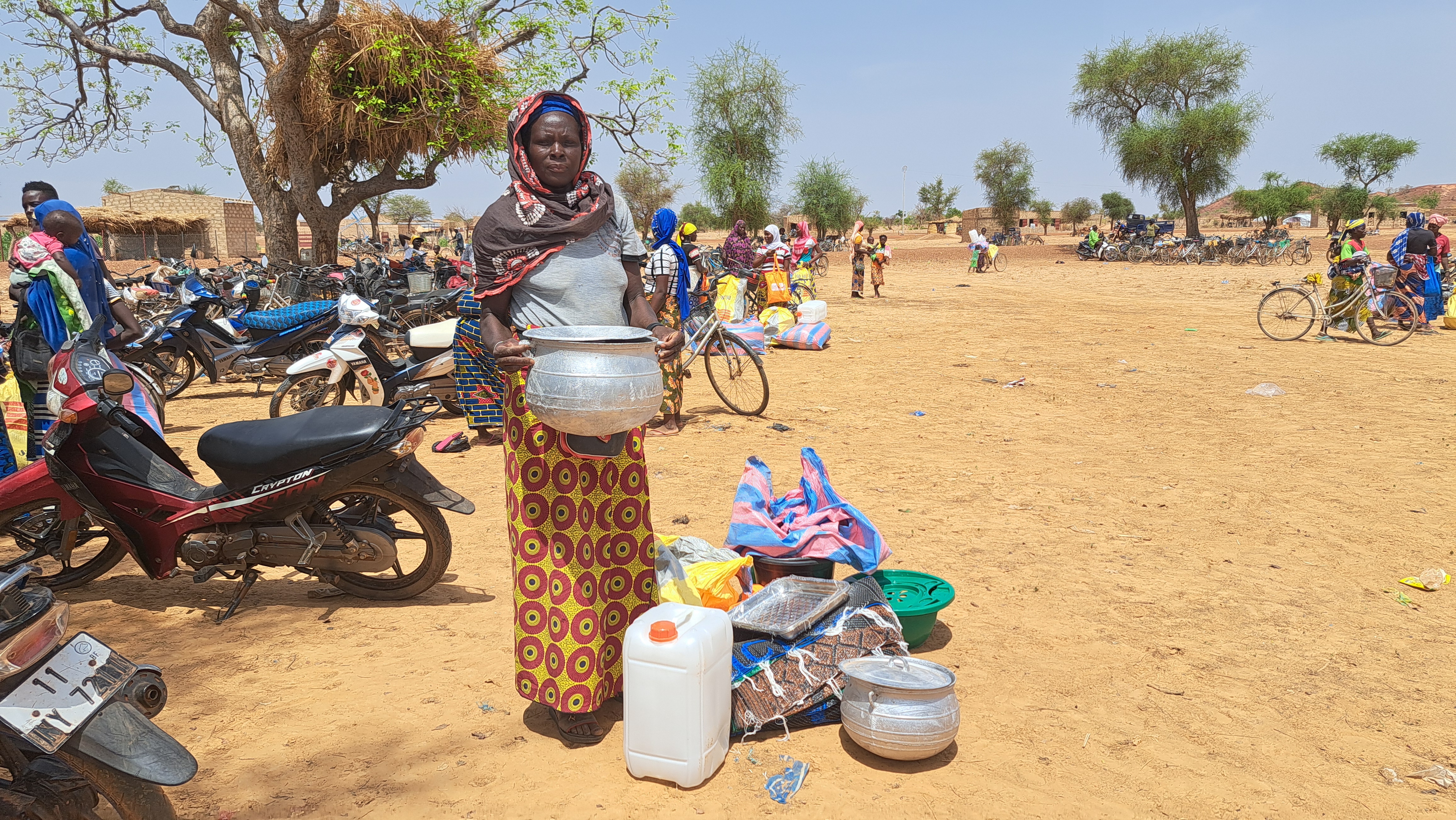 Habiba, happy to finally receive the items her family needs.