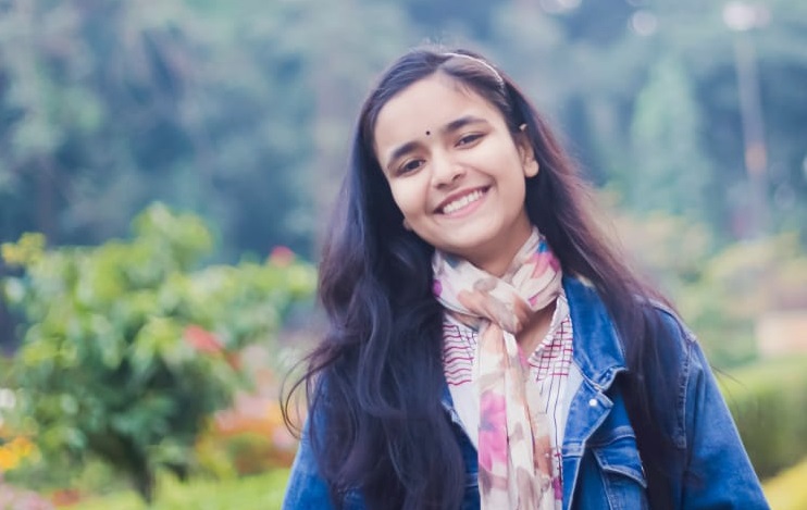 Dola, from Bangladesh, smiling at the camera