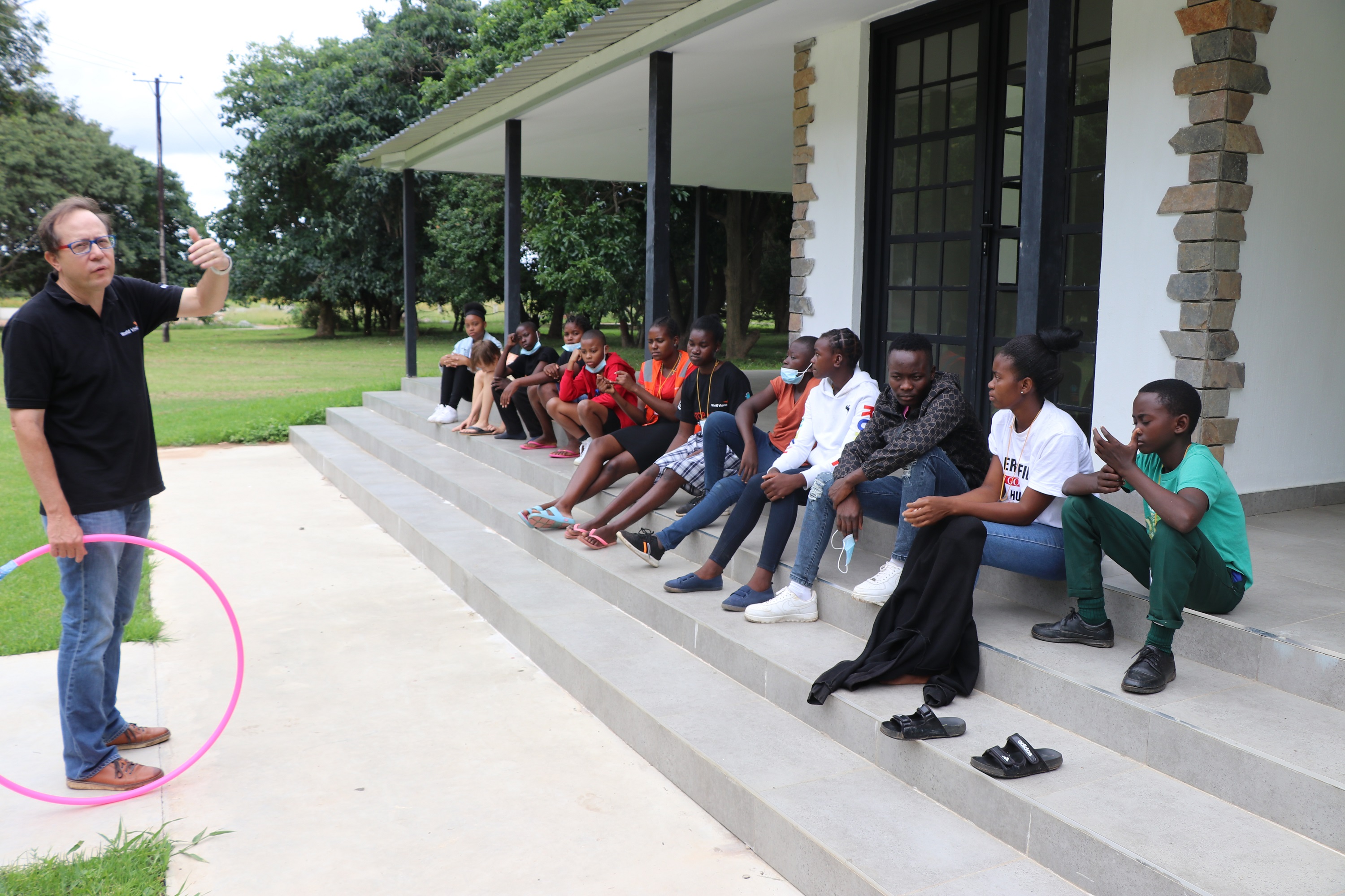 national director addressing the children