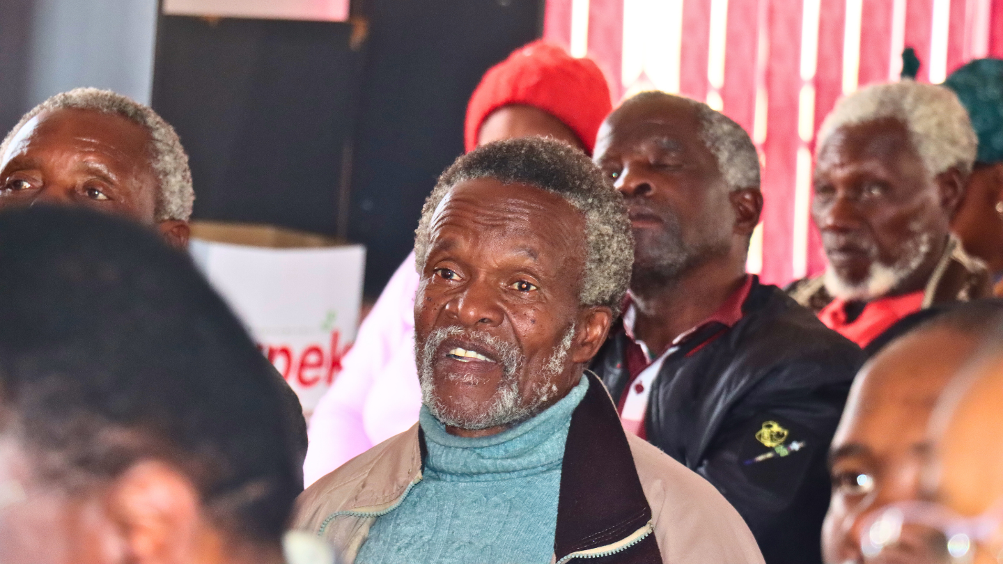 Community members discussing sustainability strategies for the projects World Vision leaves behind.