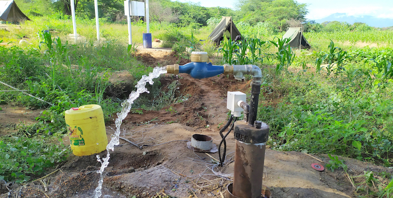 The drilling team usually erect tents (seen in the background) that serve as their home  as they implement water projects.