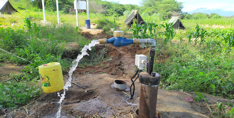 The drilling team usually erect tents (seen in the background) that serve as their home as they implement water projects.