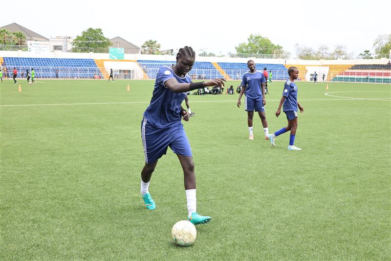 Achol Felix, a 16-year-old top scorer of the inter-school football tournament for girls. 