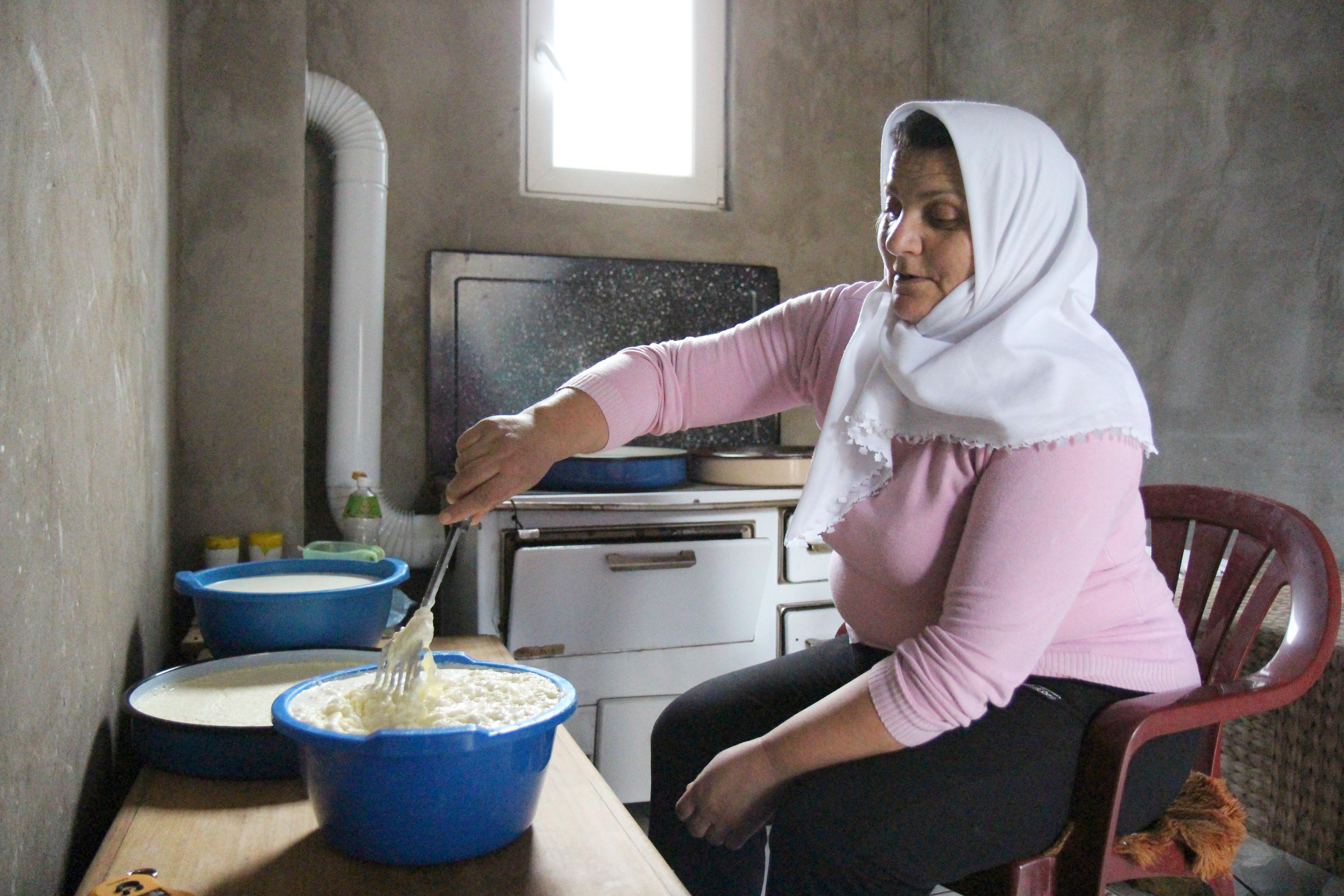 Azemina makes cheese, cream and butter.