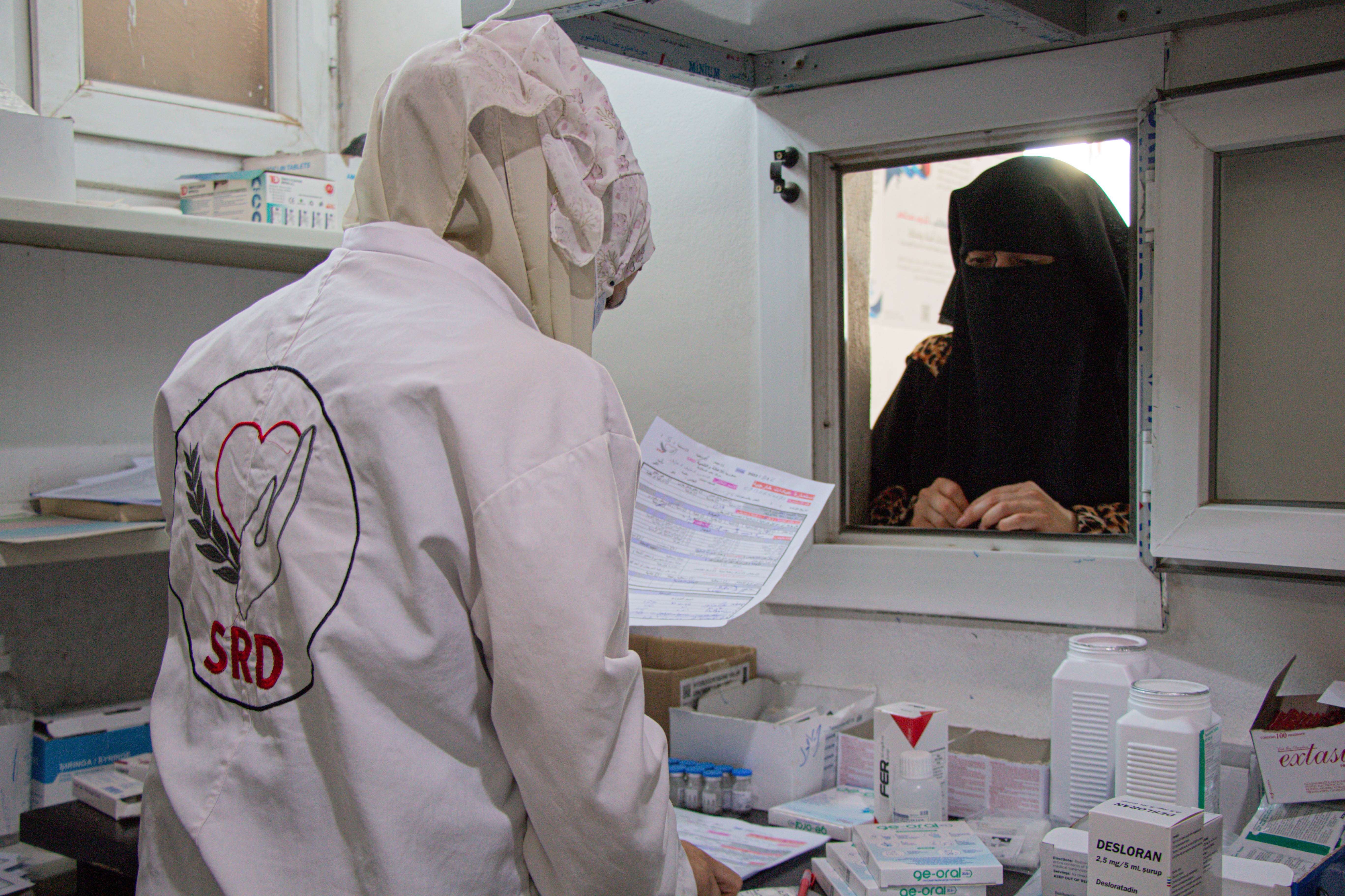 Amira getting the medications she’s been prescribed.