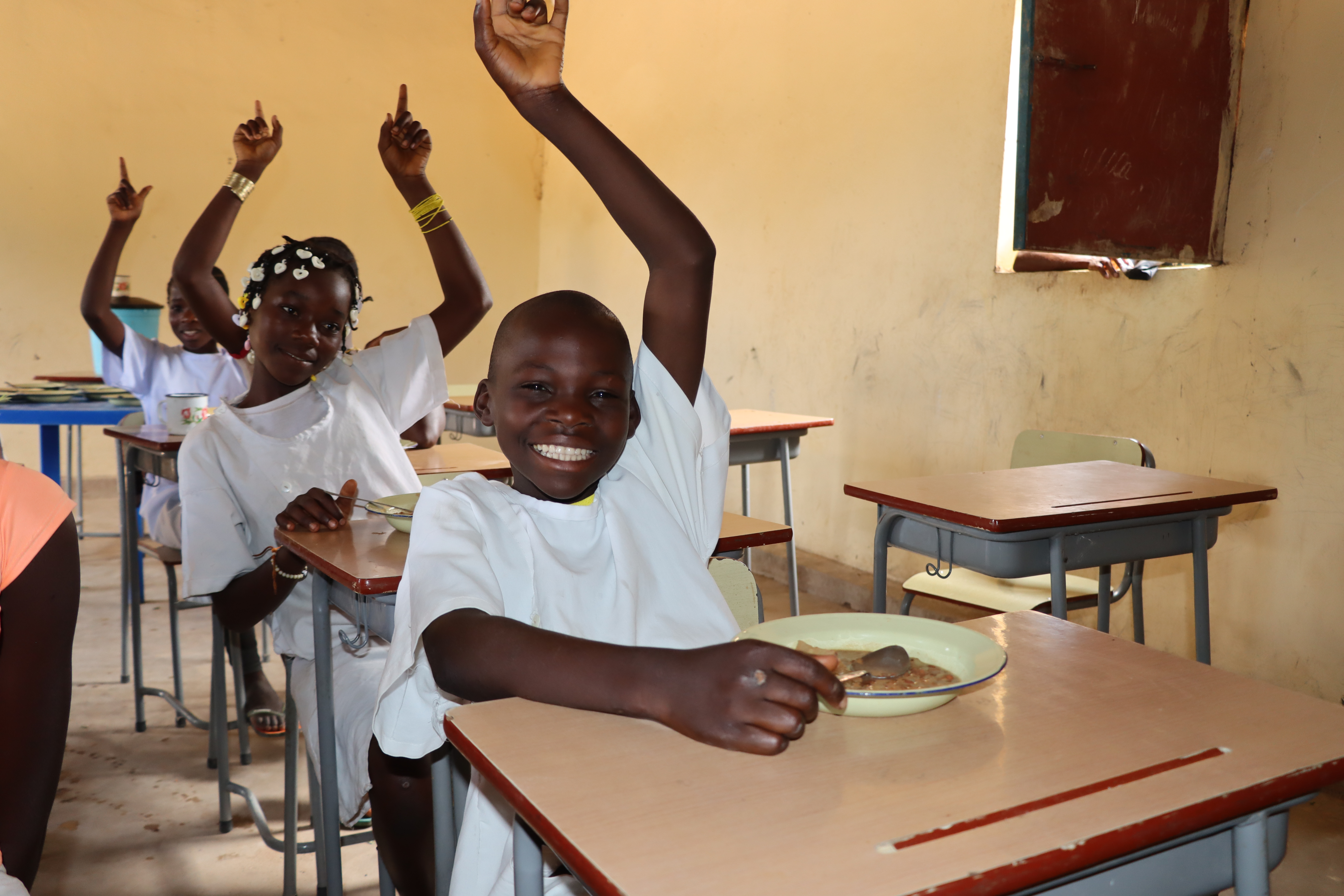 Children at school eating school meals