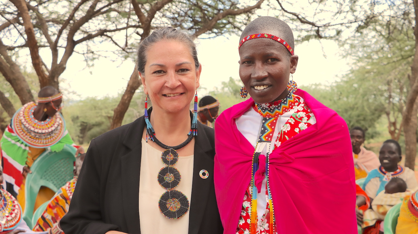 Reena Ghelani (left), the UN Assistant Secretary-General in charge of Famine Prevention and Response interacts with women who have benefitted from World Vision drought resilience interventions in Northern Kenya. ©World Vision Photo/David Nderitu.