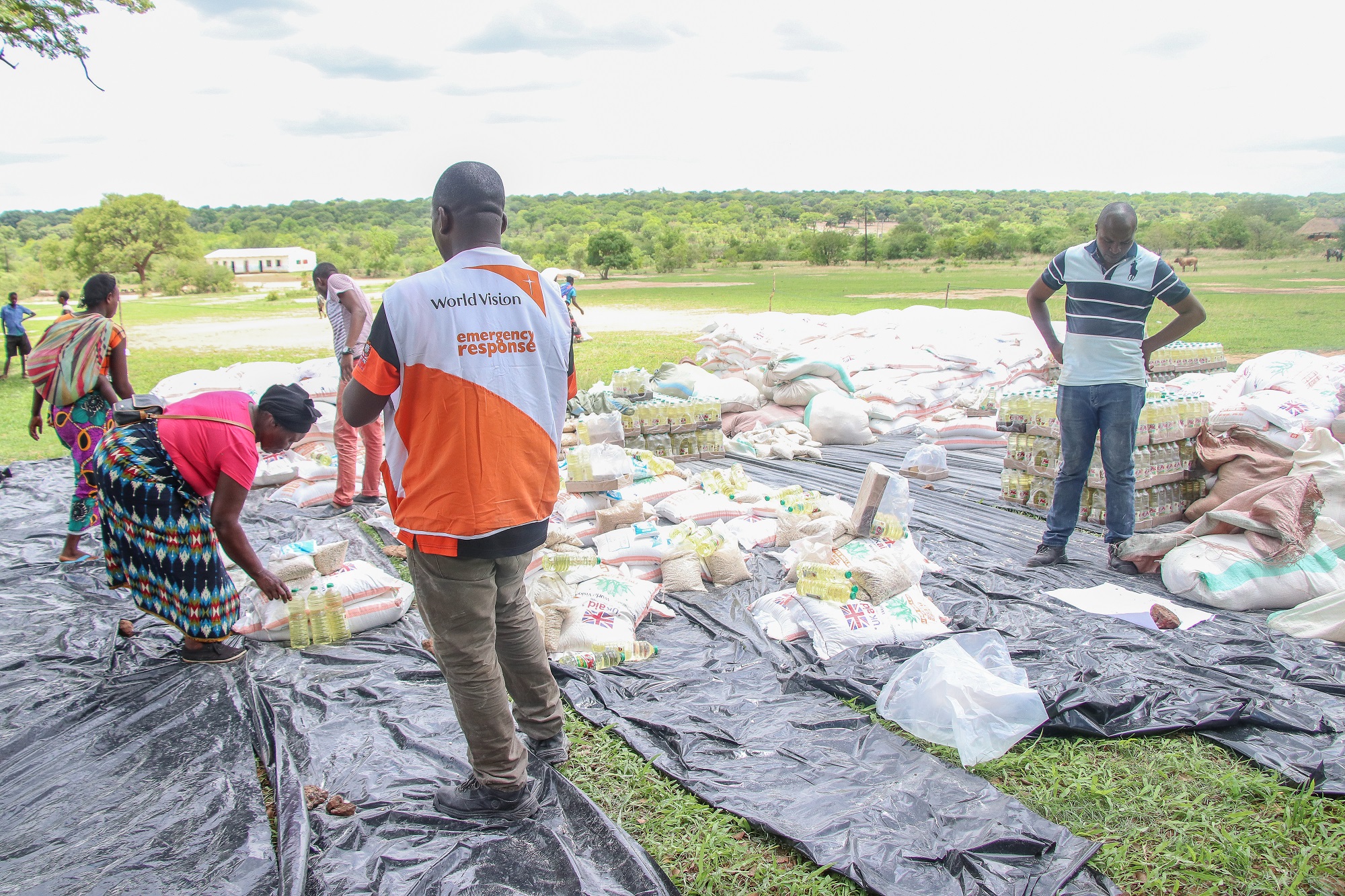 WV Zambia staff preparing for food distribution