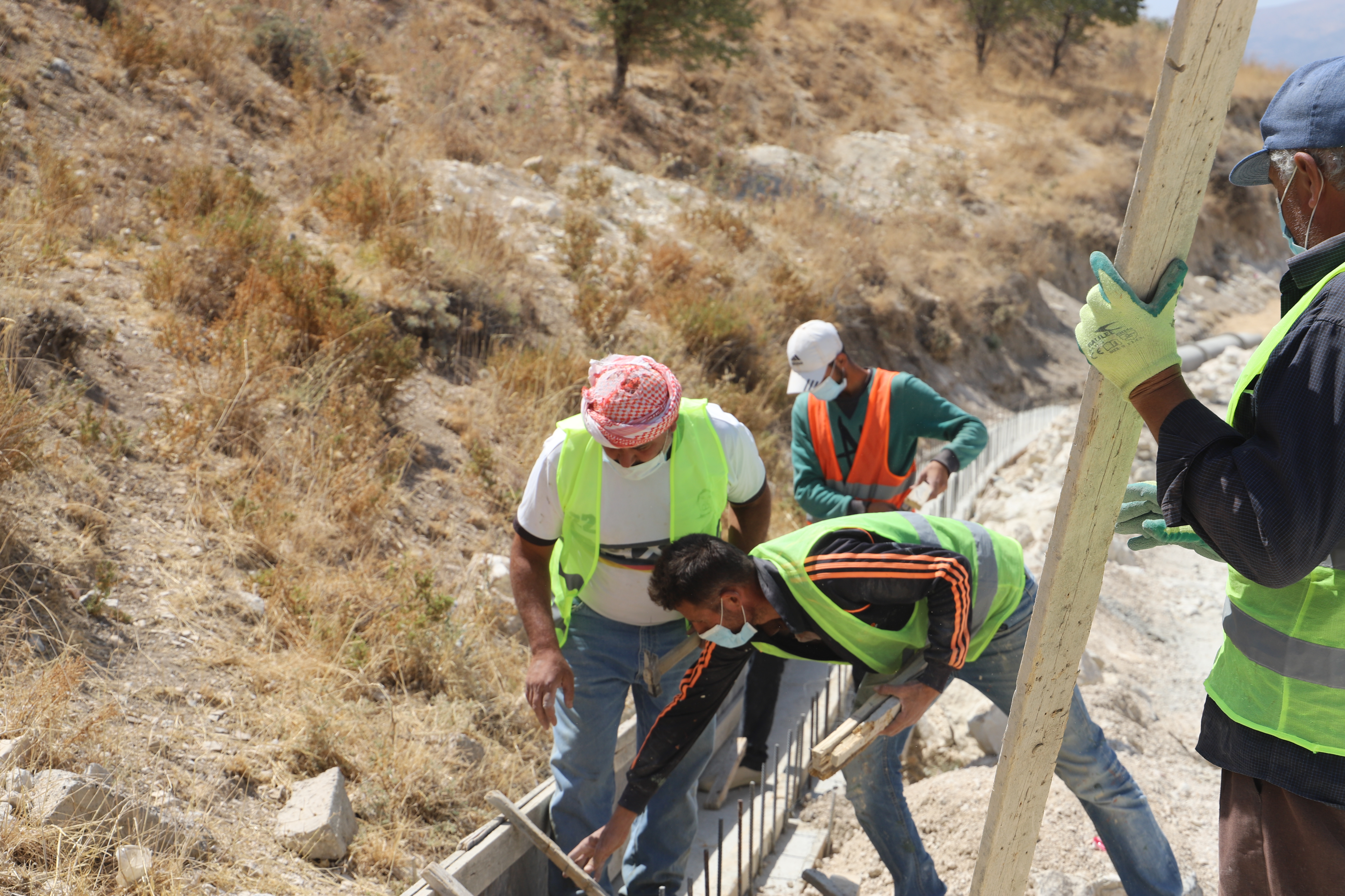 Bassam and other workers