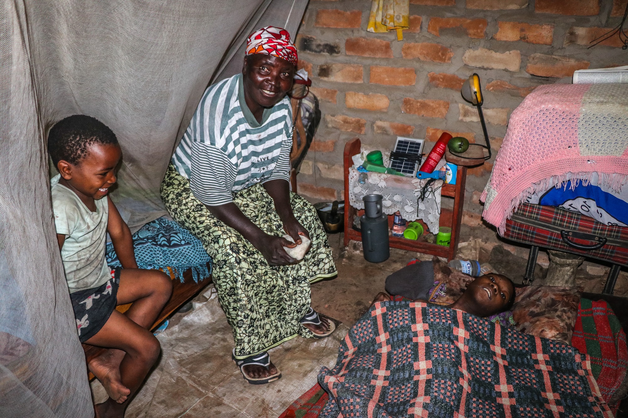 Mirriam 19, has been bedridden from the time she was 2months old following an illness. Abandoned by her mother. Her grandmother looks after her.