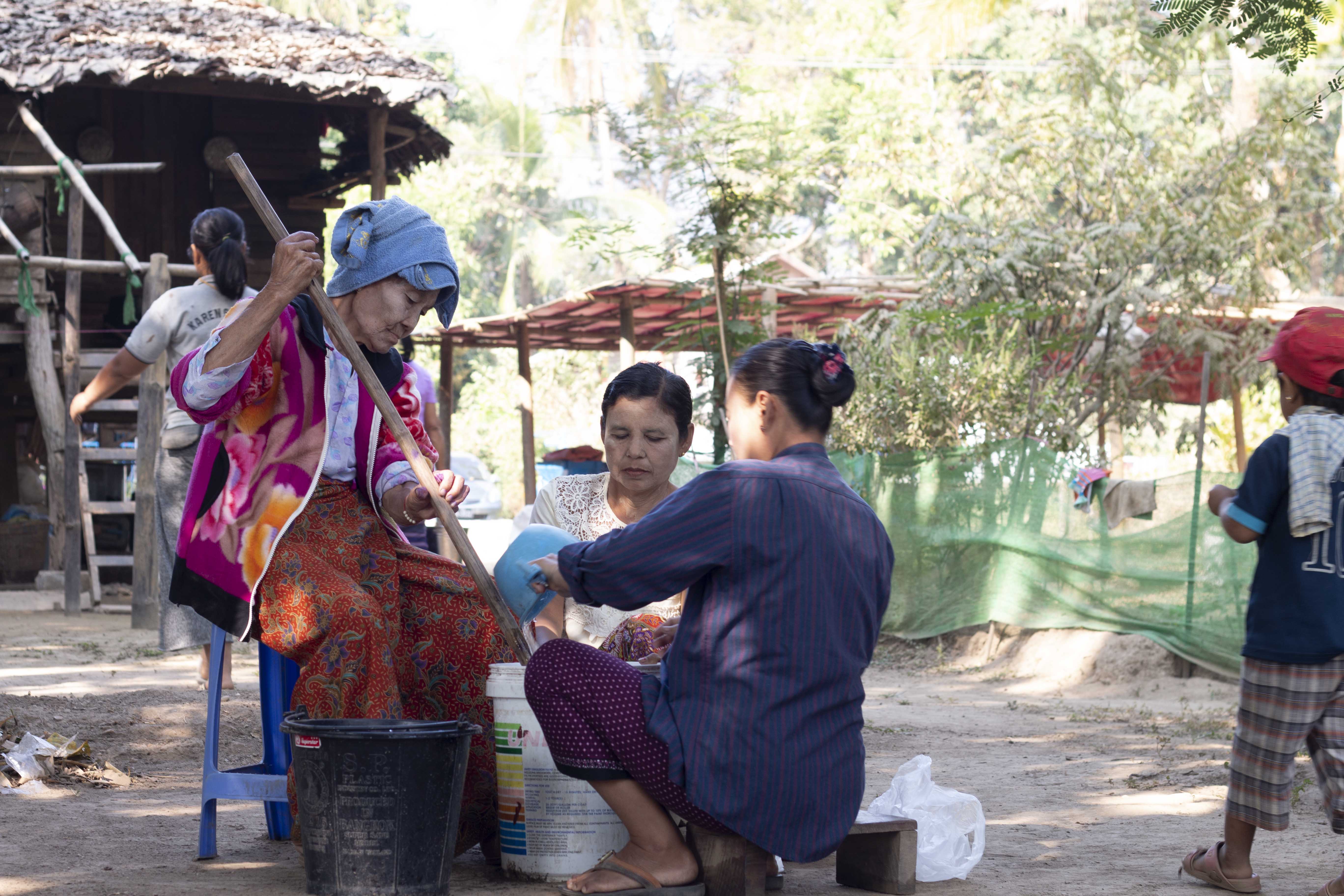 A group of women from the producer group making hand made washing soap 