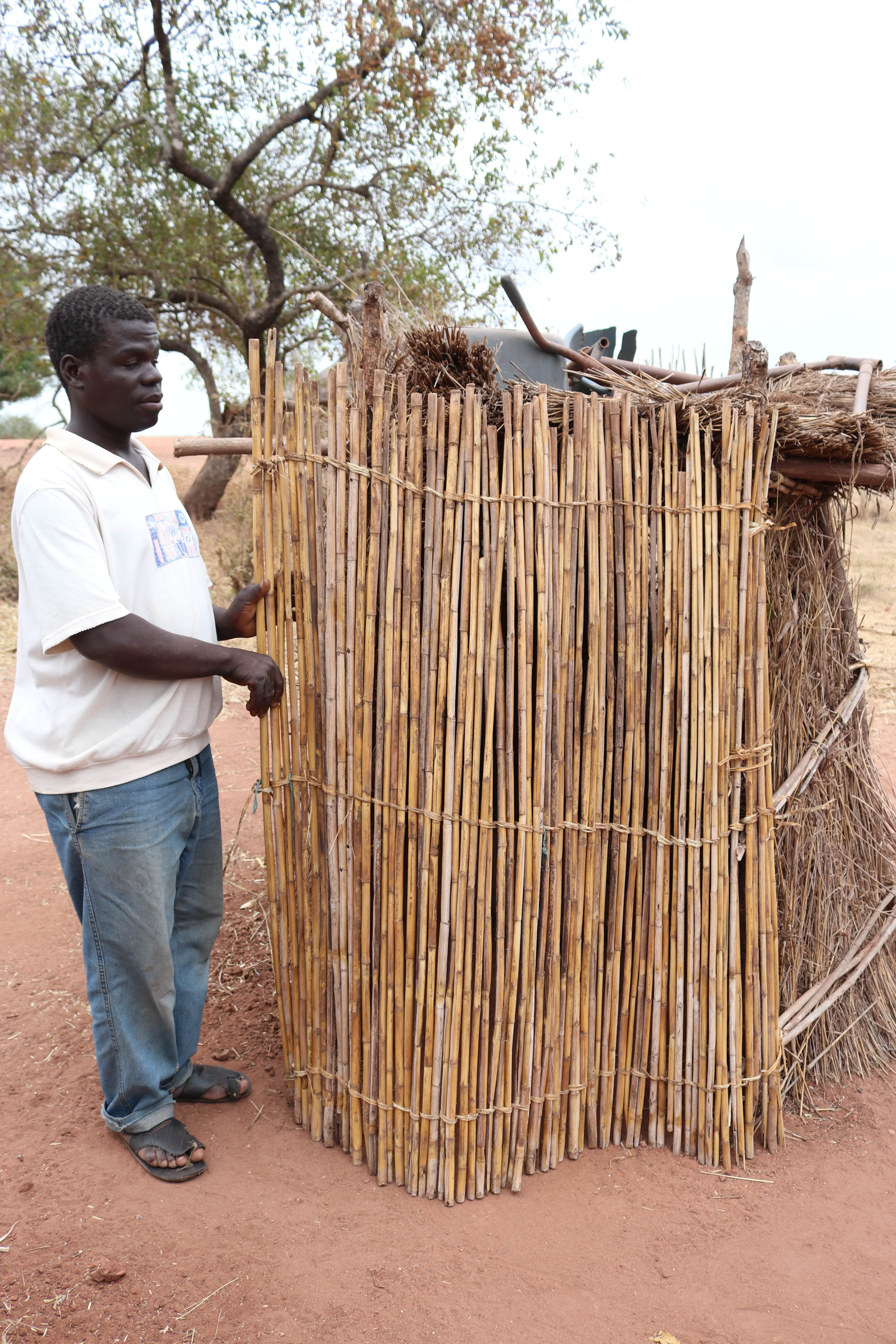 Raimundo now uses the latrine built as part of the project