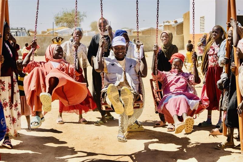 Guillaume with the children in a center