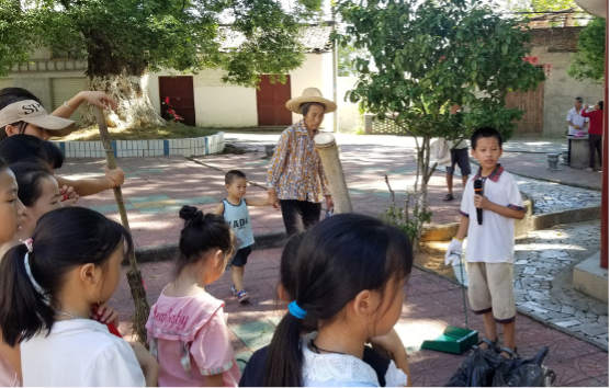 As a member of the children's group, Jay led his peers to organize a spring cleaning, serving their community by maintaining the cleanliness of their village.