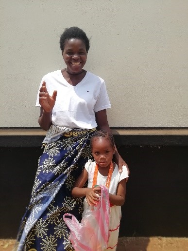 Annie, a volunteer and Abigail, waiting for sponsorship