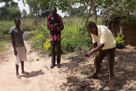 Local leader teaching hand washing