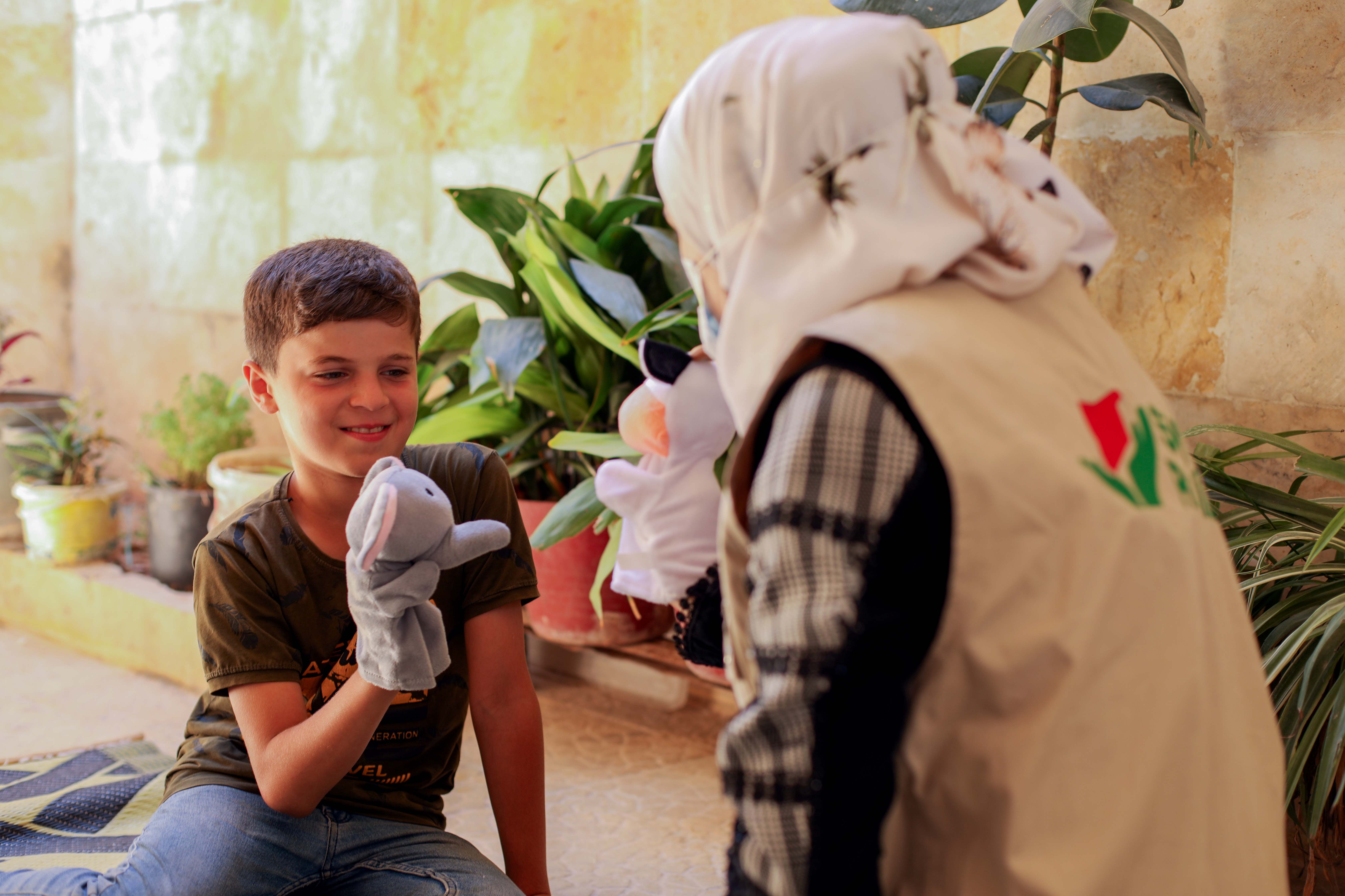 Action for Humanity, World Vision Syria Response Baker with our partner staff during a psychological support activity.