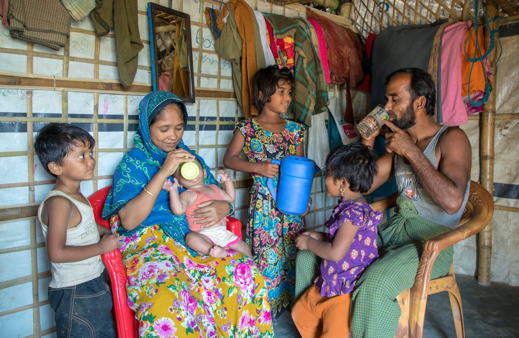 Lalaputu, her husband Rahamat, and four of their six children