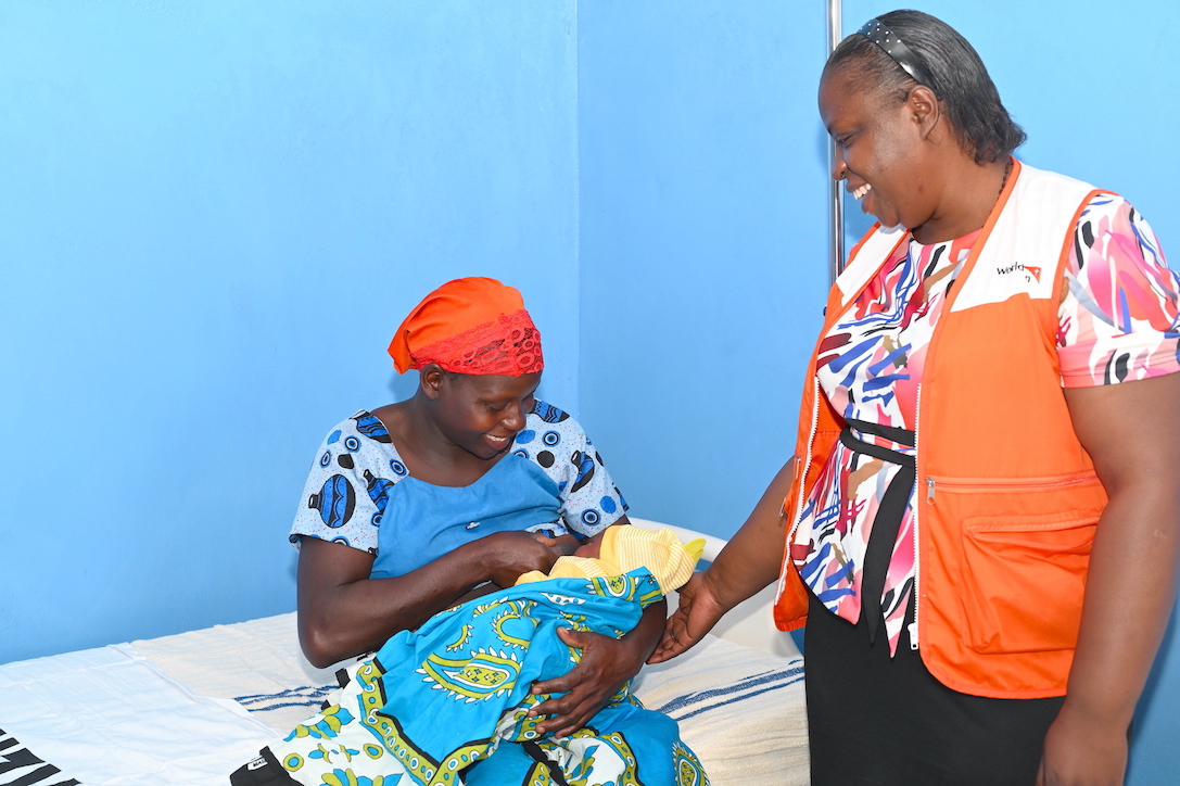 Eunice Ako sensitises a new mother on the importance of breastfeeding babies  so as to enhance their nutrition status and cushion them from diseases.