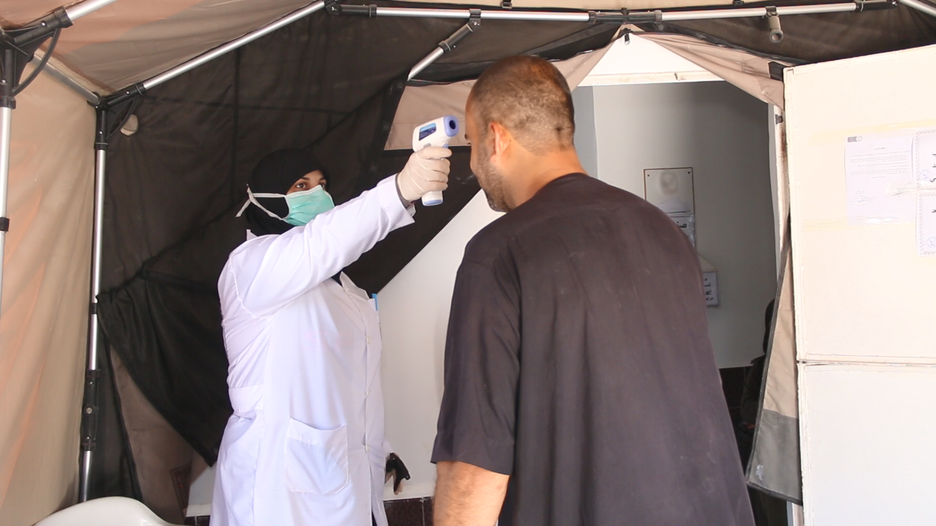 At WV’s health centre’s isolation tent, basic safety examinations against COVID-19 are performed to assess patients’ conditions.