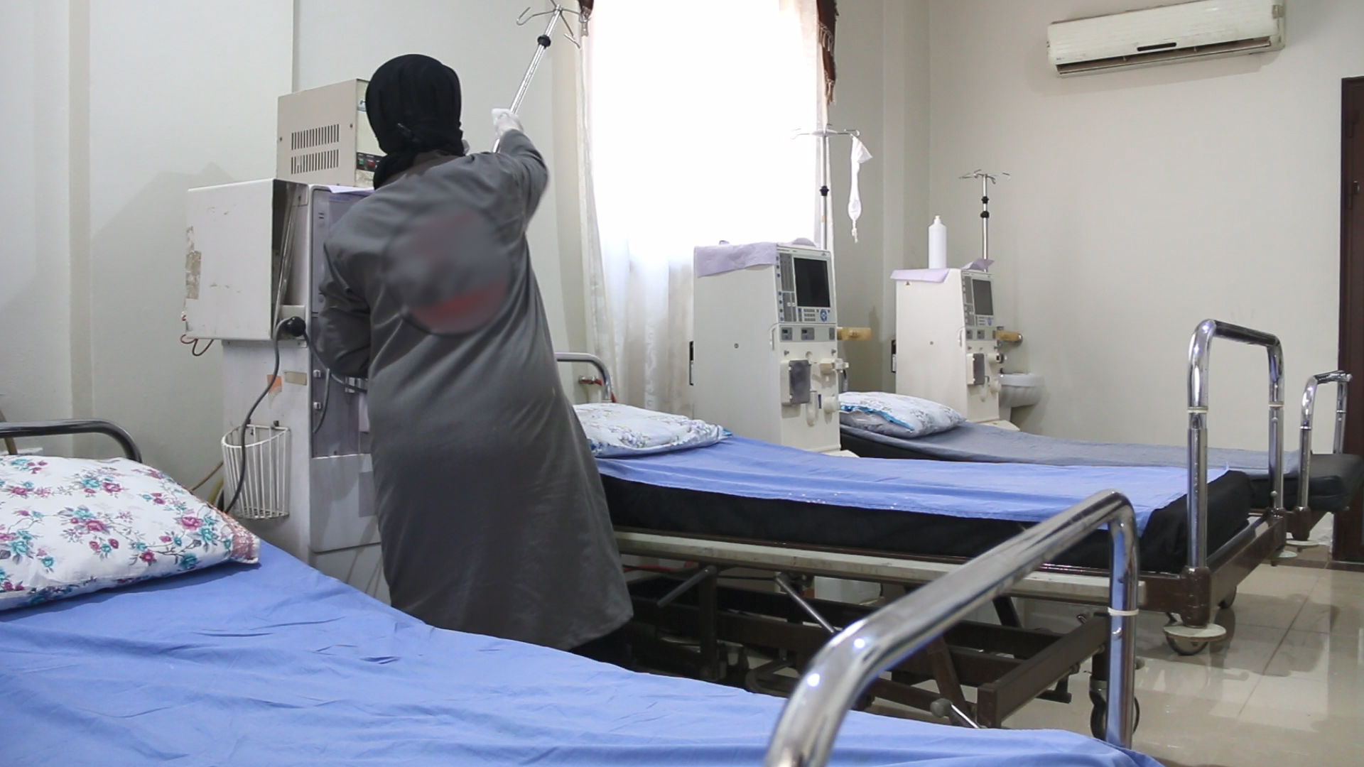A nurse preparing the haemodialysis room to receive patients at the hospital, which received cases of regular and emergency kidney sessions.
