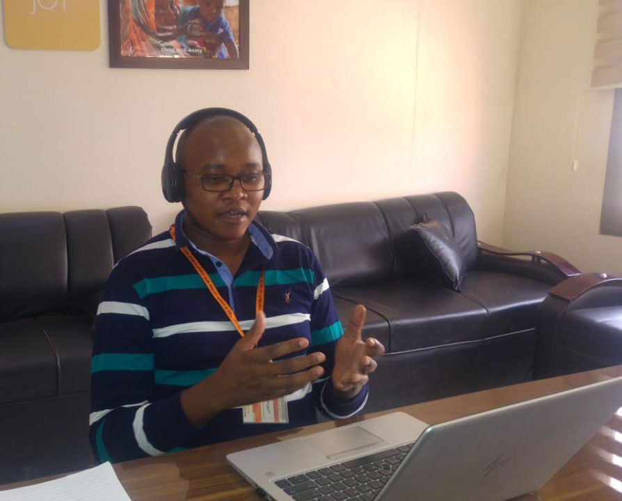 Martin Munguti, World Vision Sudan WASH manager, participating in the weekly virtual meetings for COVID-19 in Khartoum. 