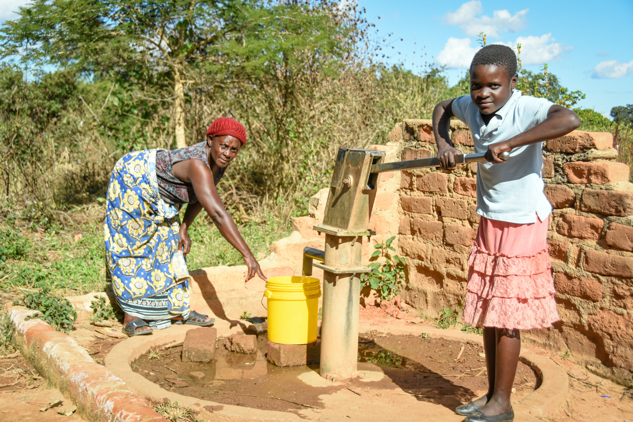 Maves fetching water from the Borehole