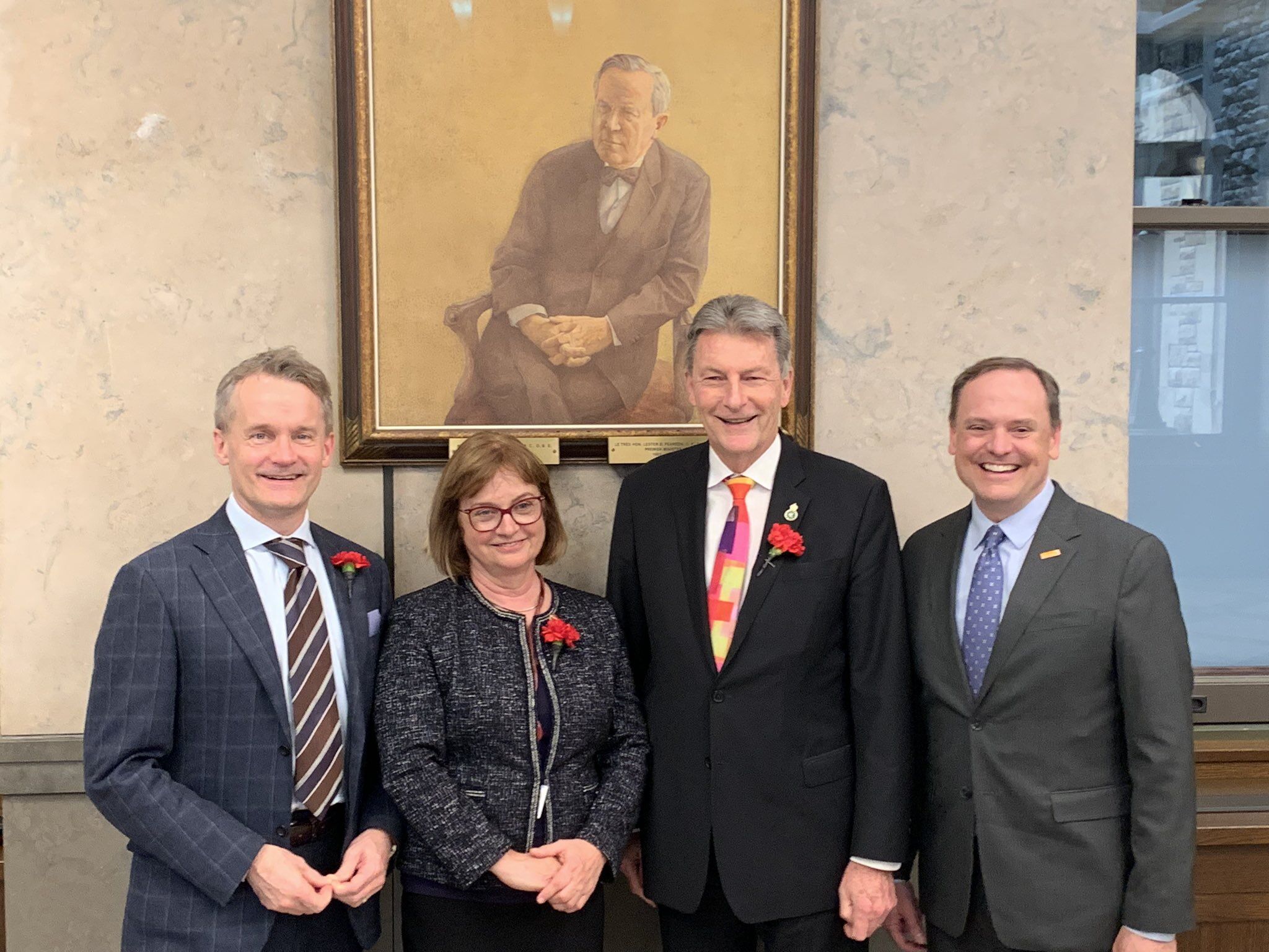 Michael Messenger with others involved with the passing of the bill