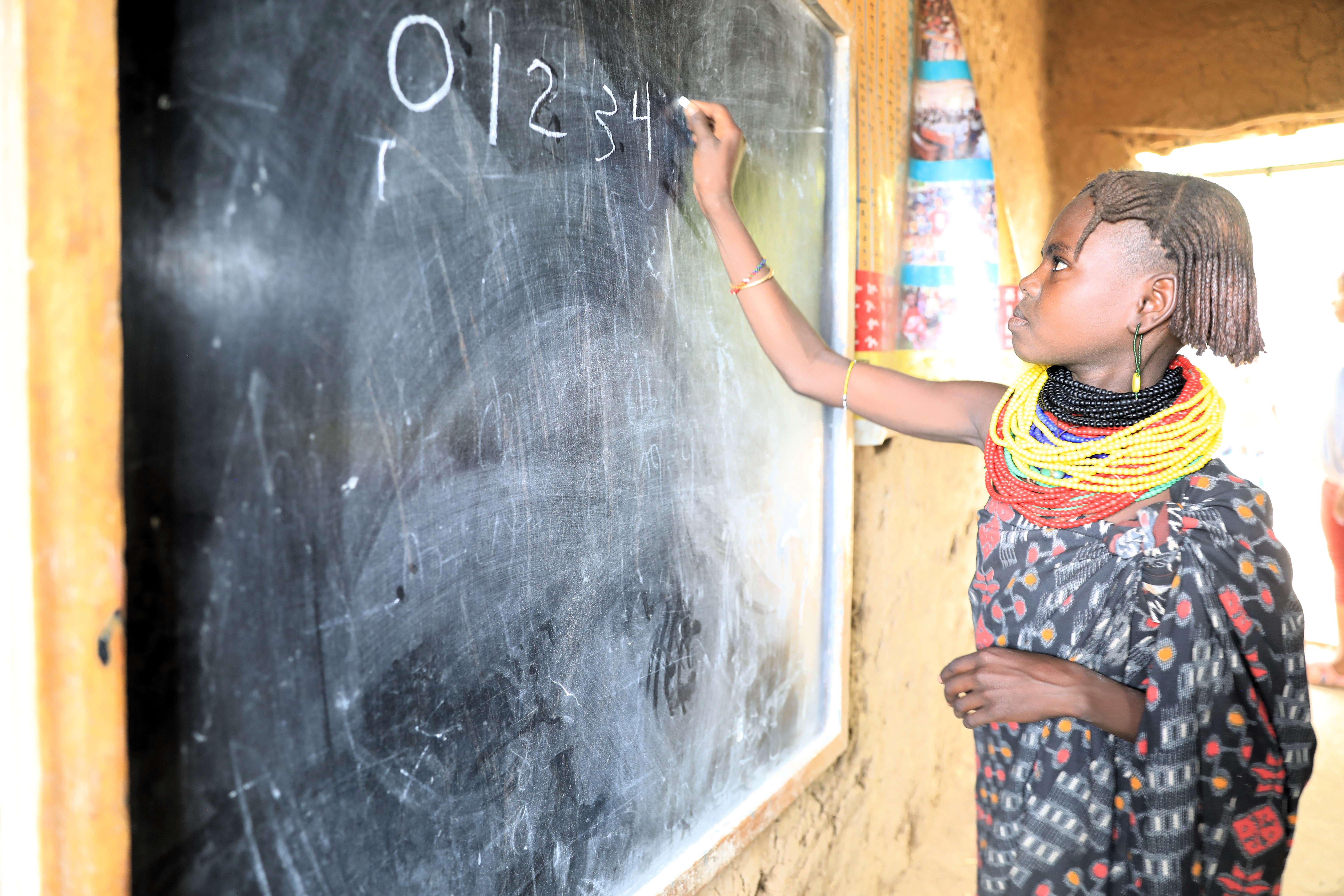 Naurchel learning numbers at school