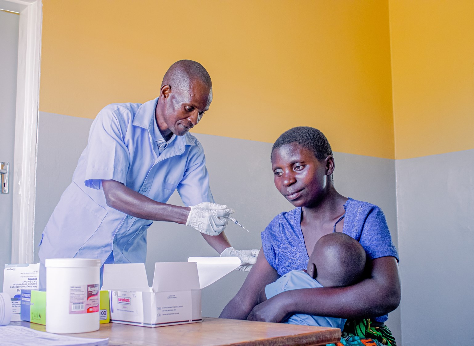 Dule assisting a client with family planning service.