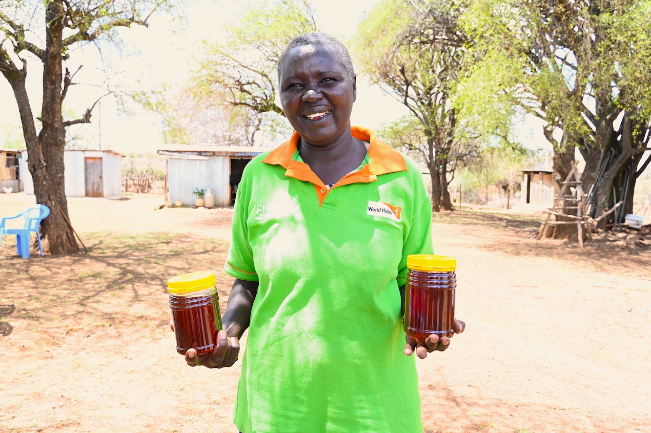 Nancy has over 20 beehives that produce at least 10kgs of honey each when harvesting. She sells 1Kg at 1,000 Kenyan Shillings. ©World Vision Photo/Hellen Owuor.