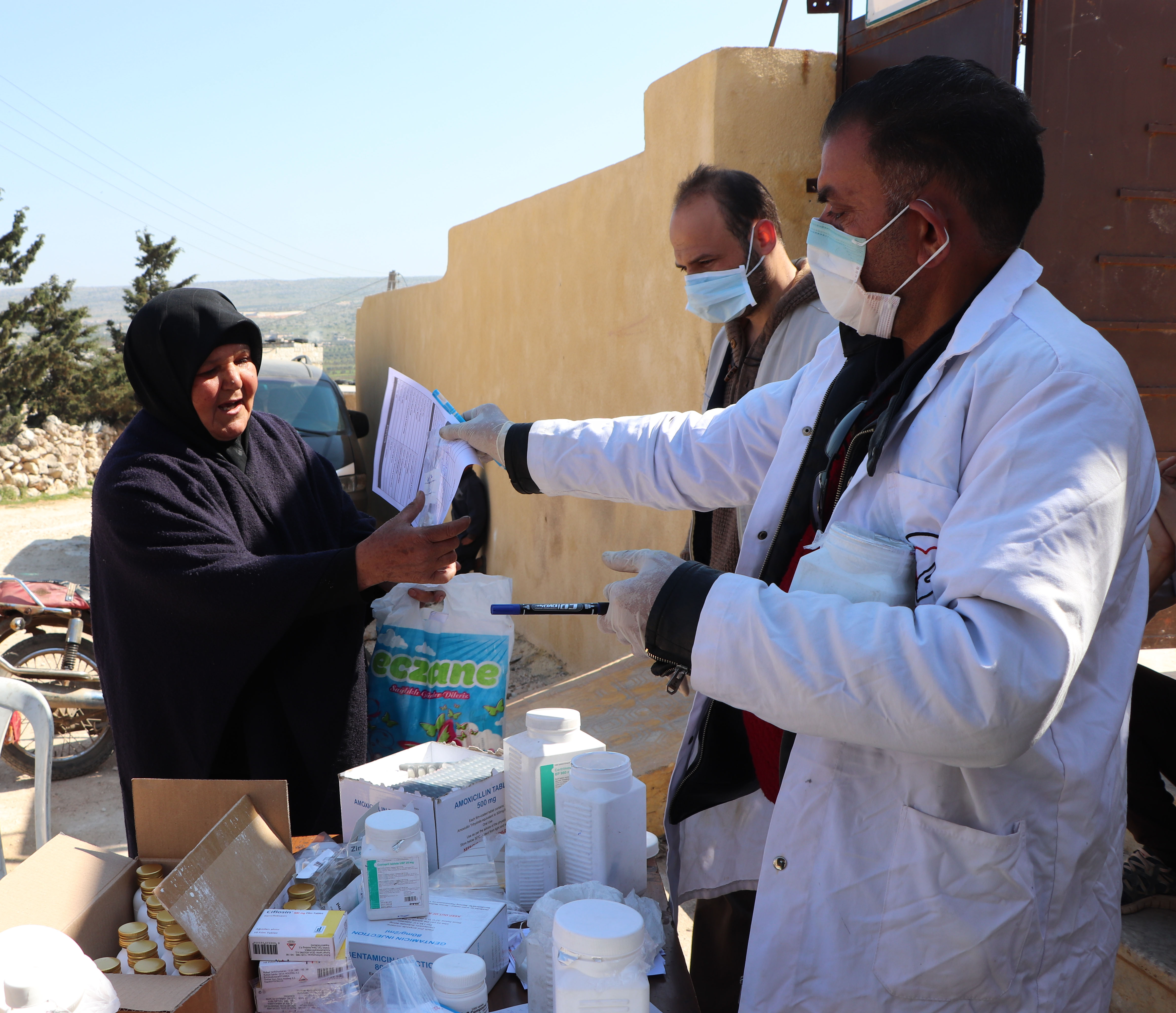 Balsam* receiving medication prescribed for her in North-West Syria