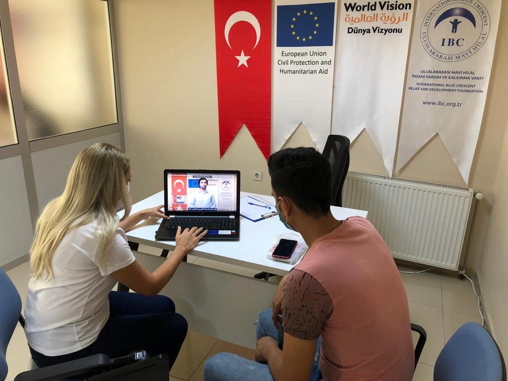 Walid* is watching recently produced videos on psychosocial and legal topics, which were broadcast on International Blue Crescent Relief and Foundation’s (IBC) social media channels.