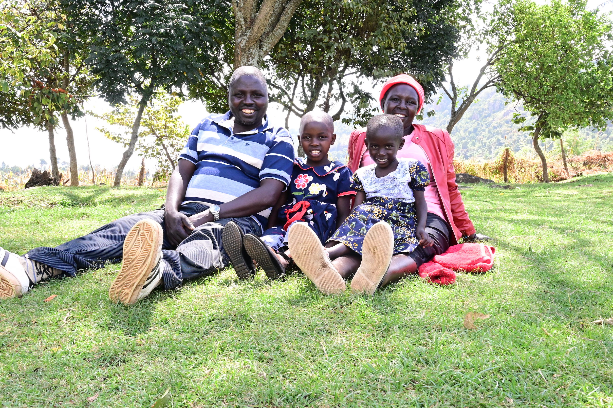Lazarus and his family can comfortably sit under the shade and enjoy the cool scenic ambience in their compound. ©World Vision photo/Hellen Owuor.