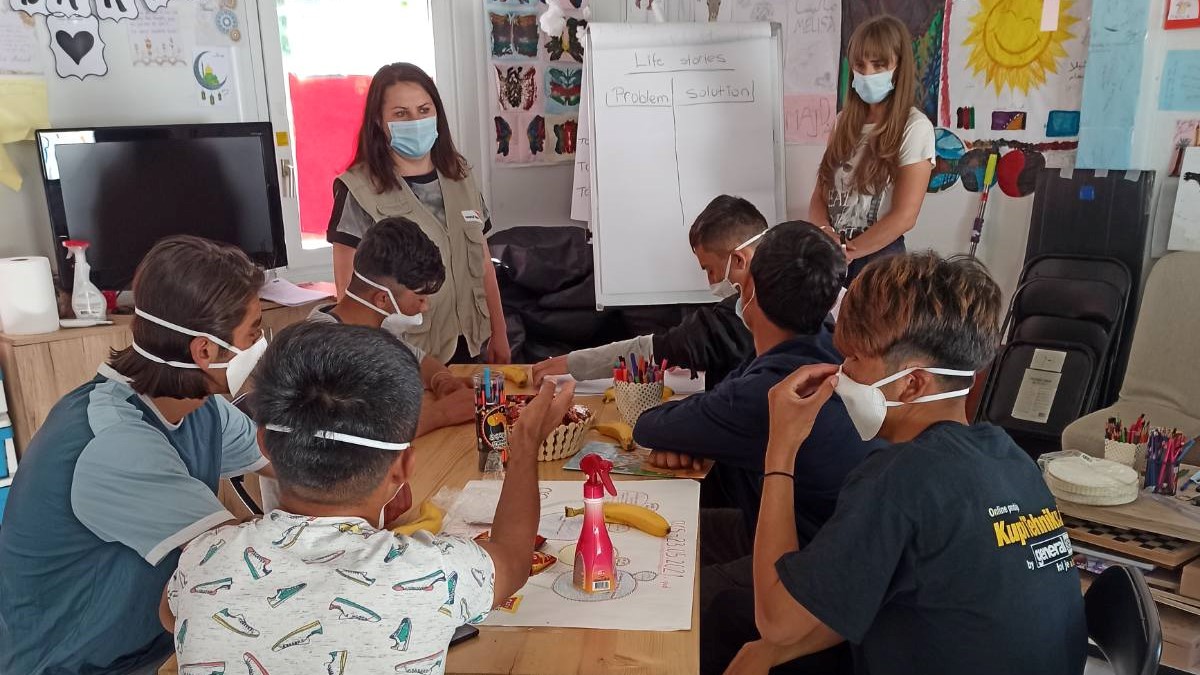 Informal educcation session in a refugee camp.