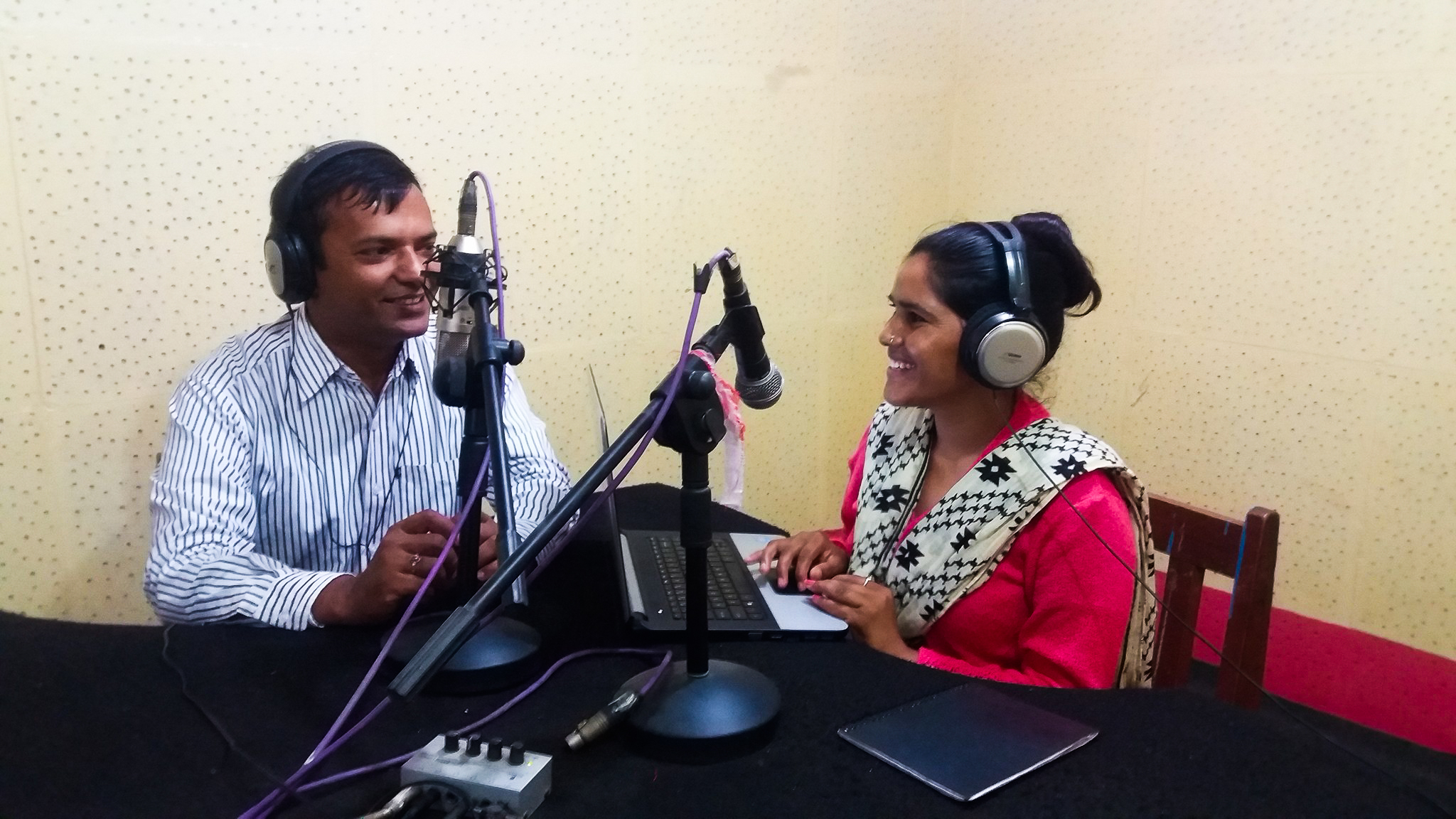 Deepak Acharya, Manager, ACORAB hosts a radio programme.