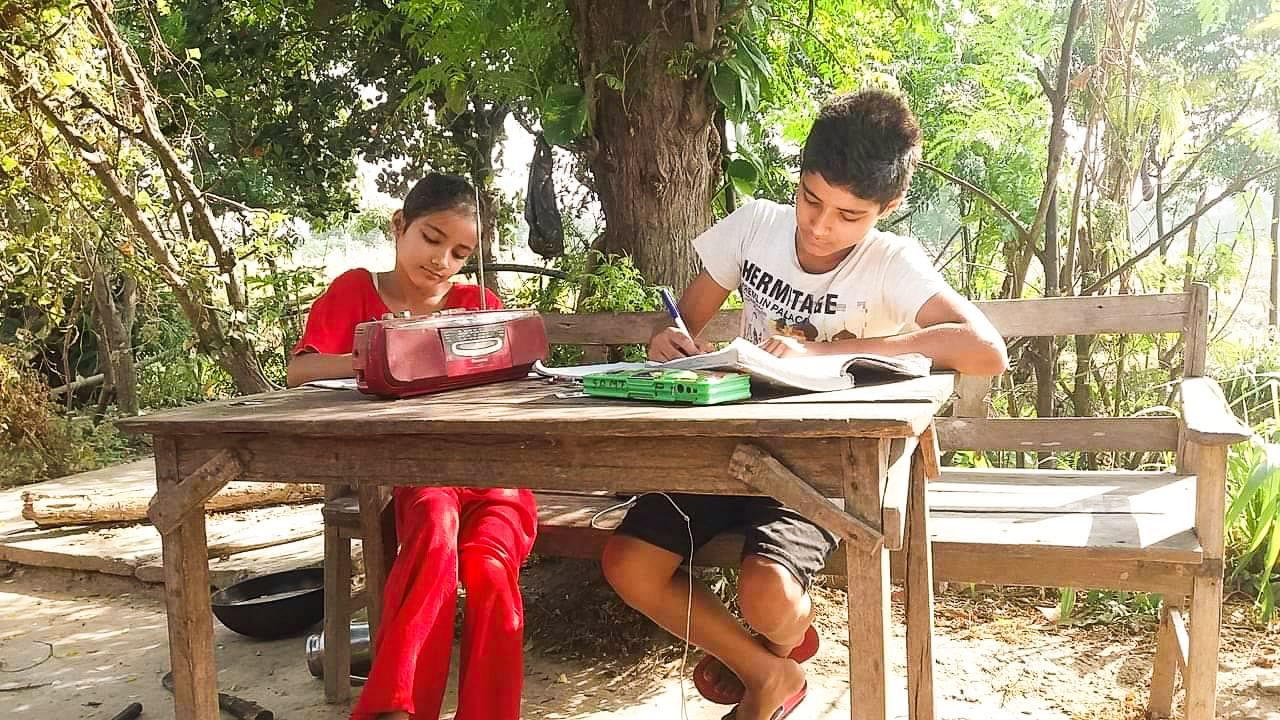 Children in rural Nepal listen and learn from a radio learning programme during the nation-wide lockdown implemented by the Government of Nepal to limit the spread of COVID-19.