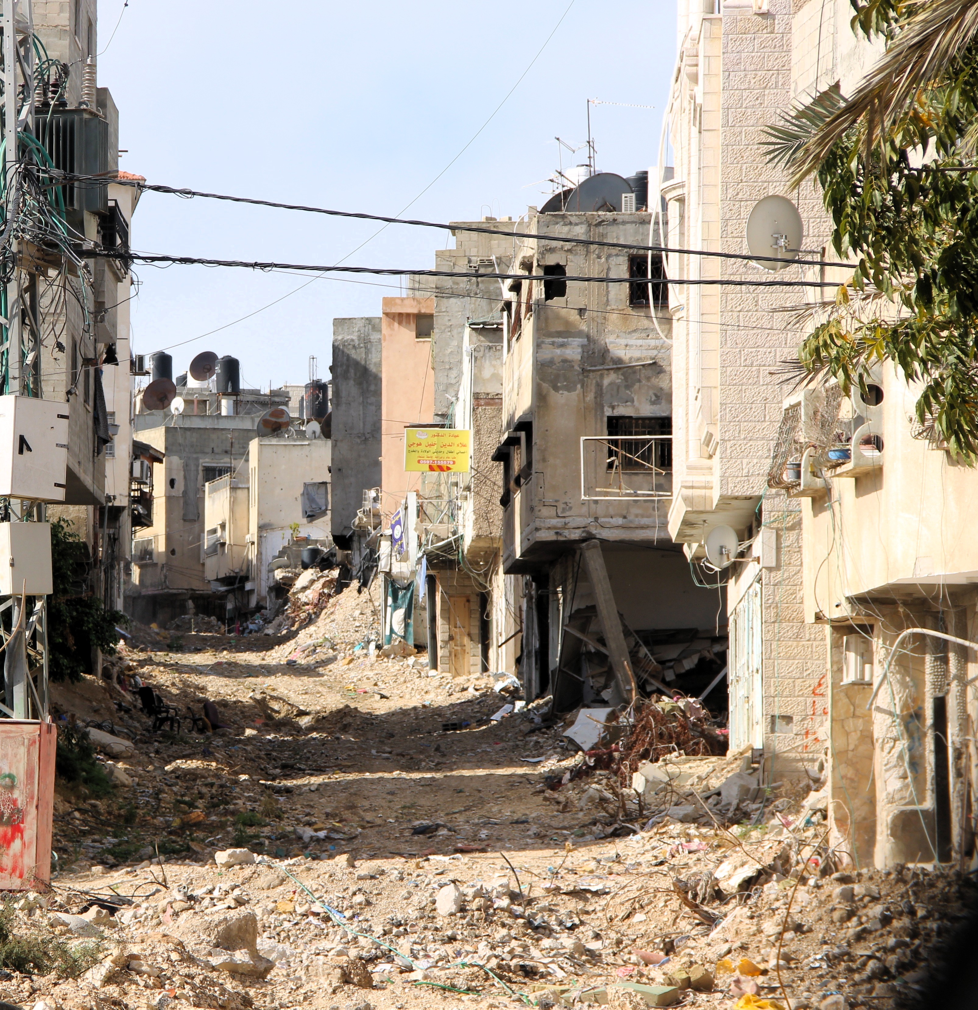 Damaged road in Nur Shams refugee camp in the North of the West Bank