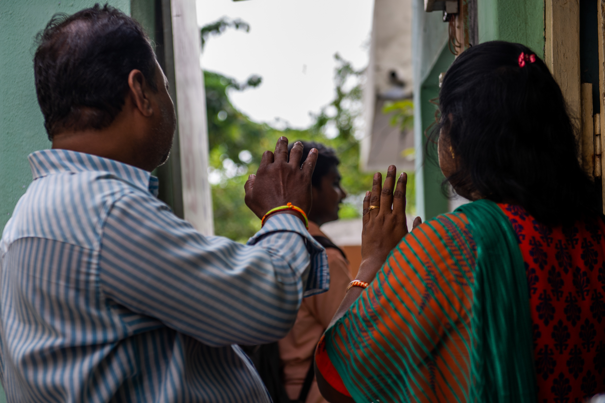 Premalatha with her husband and son