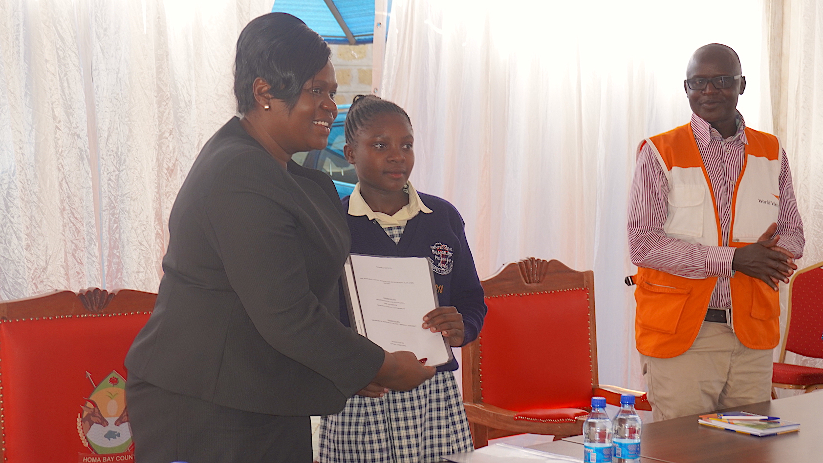 Gladys Wanga, Homa Bay County Governor receives a memorandum with issues that children would like the county to address. ©World Vision Photo/Felix Pilipili.