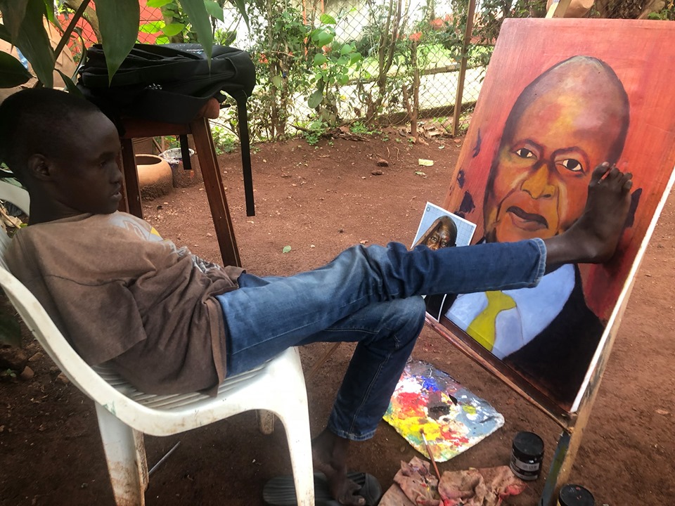 Richard, drawing a portrait of the President of Uganda, Yoweri Museveni