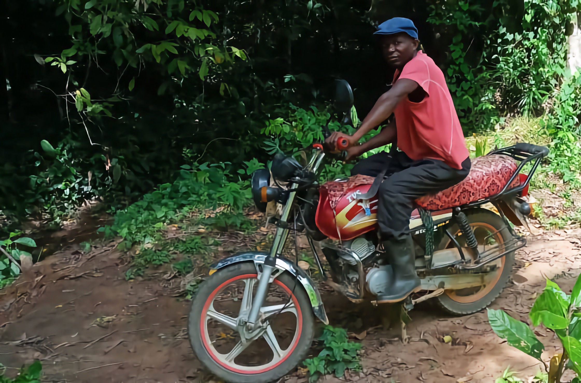 Pastor Emmanuel riding his bike