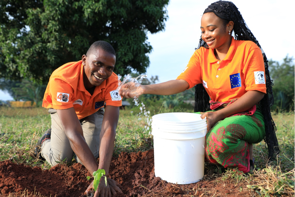 Rajabu Iddi (left) and Amina Athumani planting a tree at their home town grounds in Ugweno village