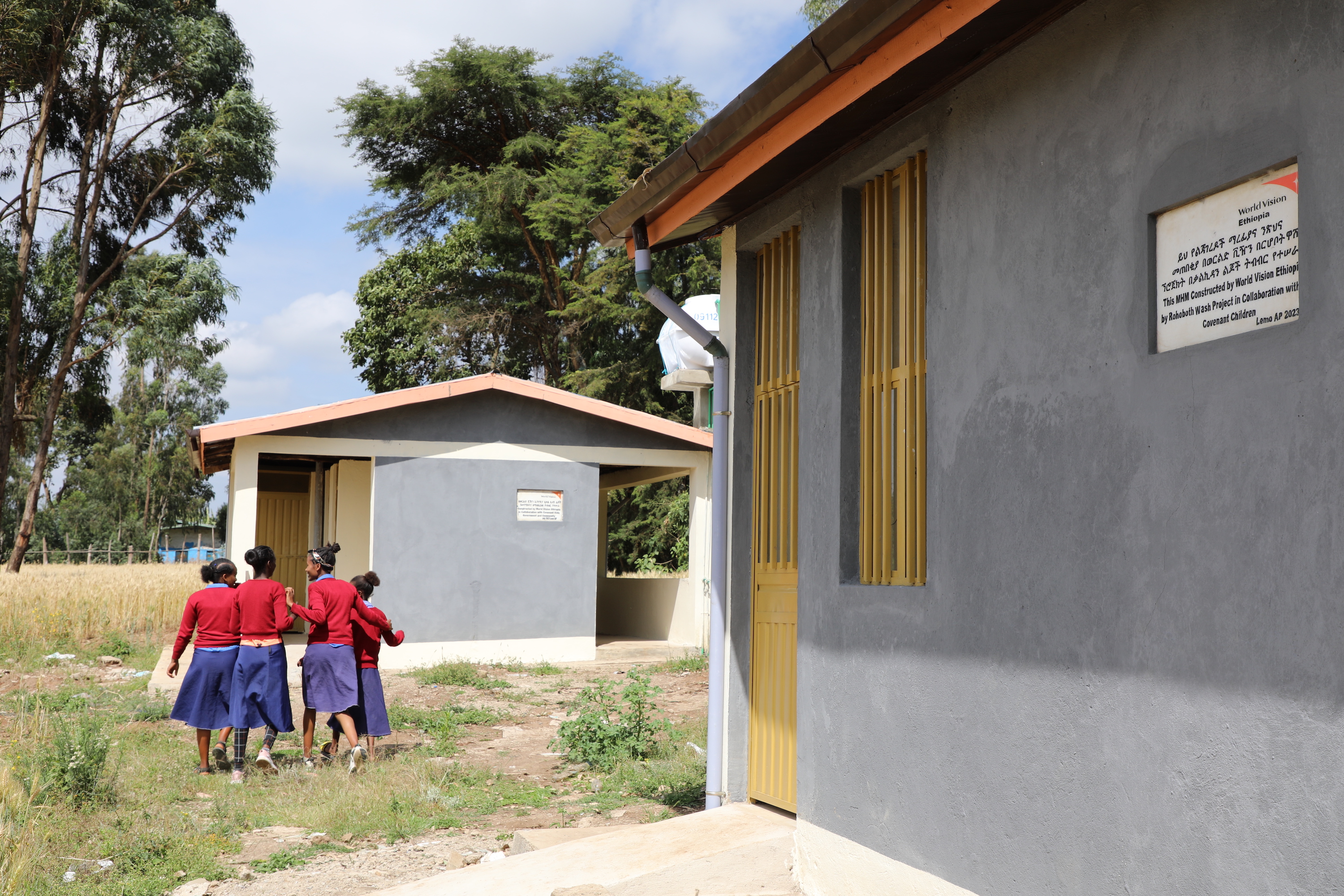 Schoolgirls Visiting the New Latrine