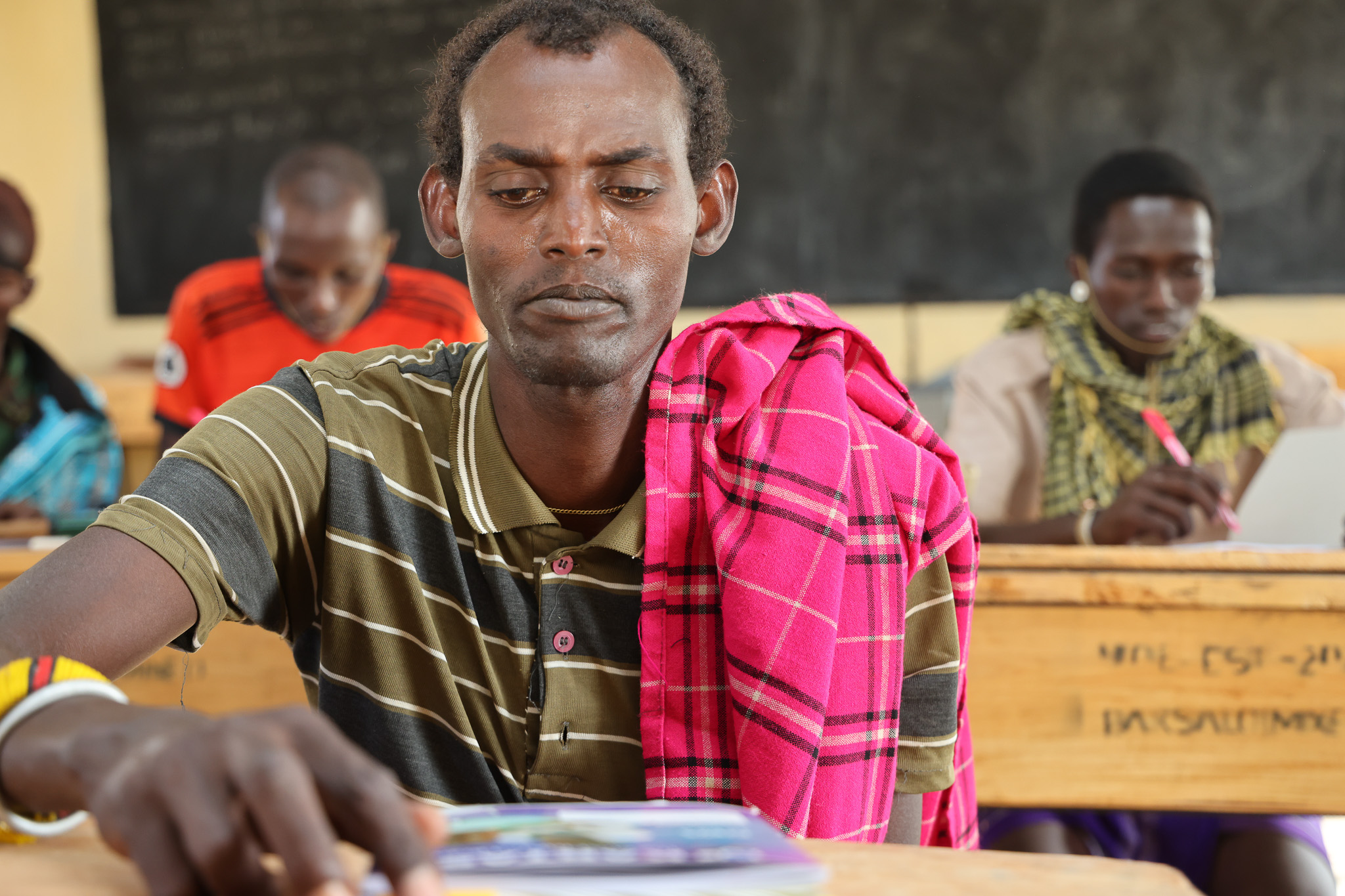 Supken Lenkaina is determined to protect his younger sisters from child marriage and female genital mutilation, standing up as a guardian of their rights and future. © World Vision Photo/David Nderitu