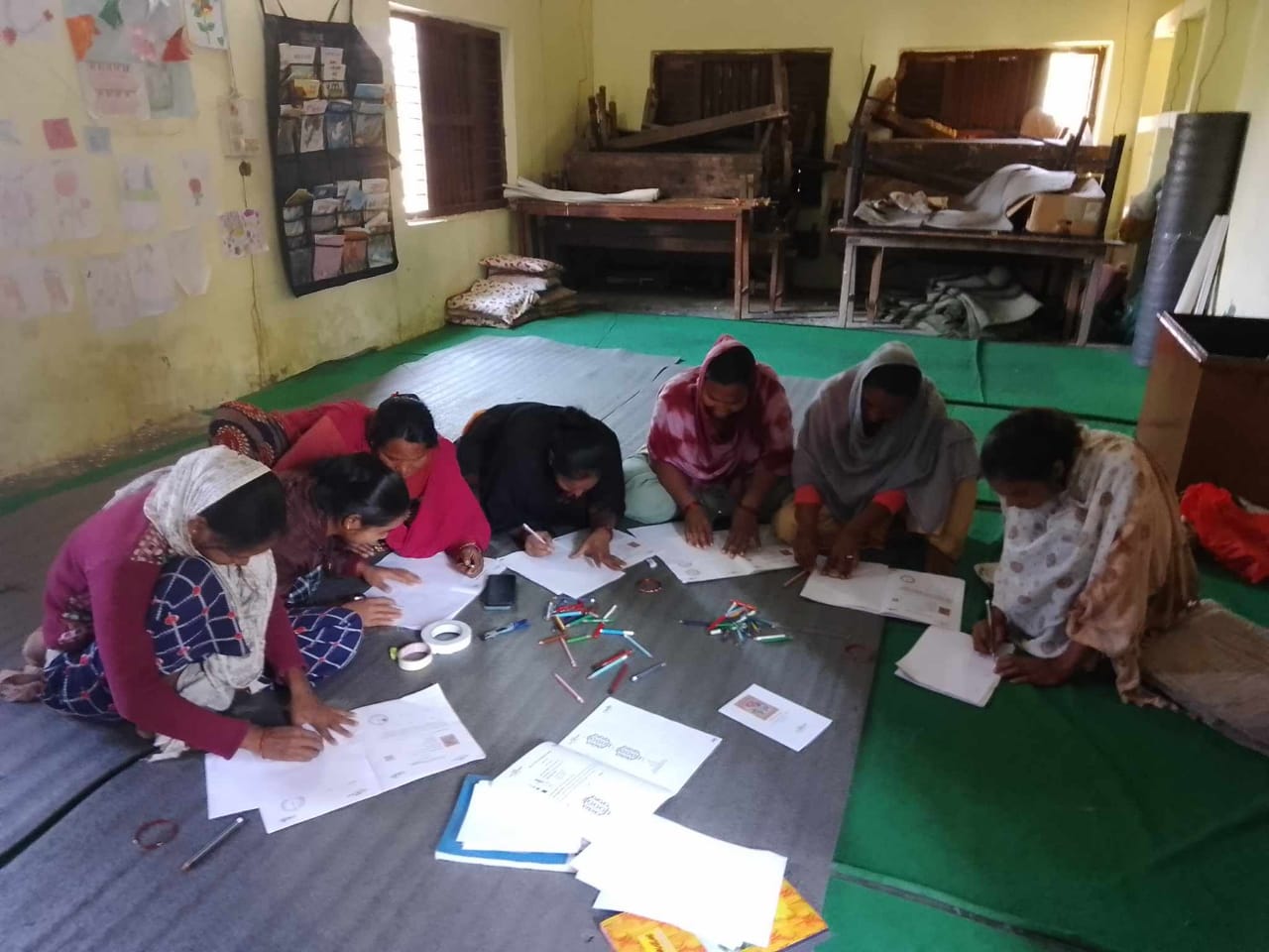 Urmila and other caregivers in learning camp