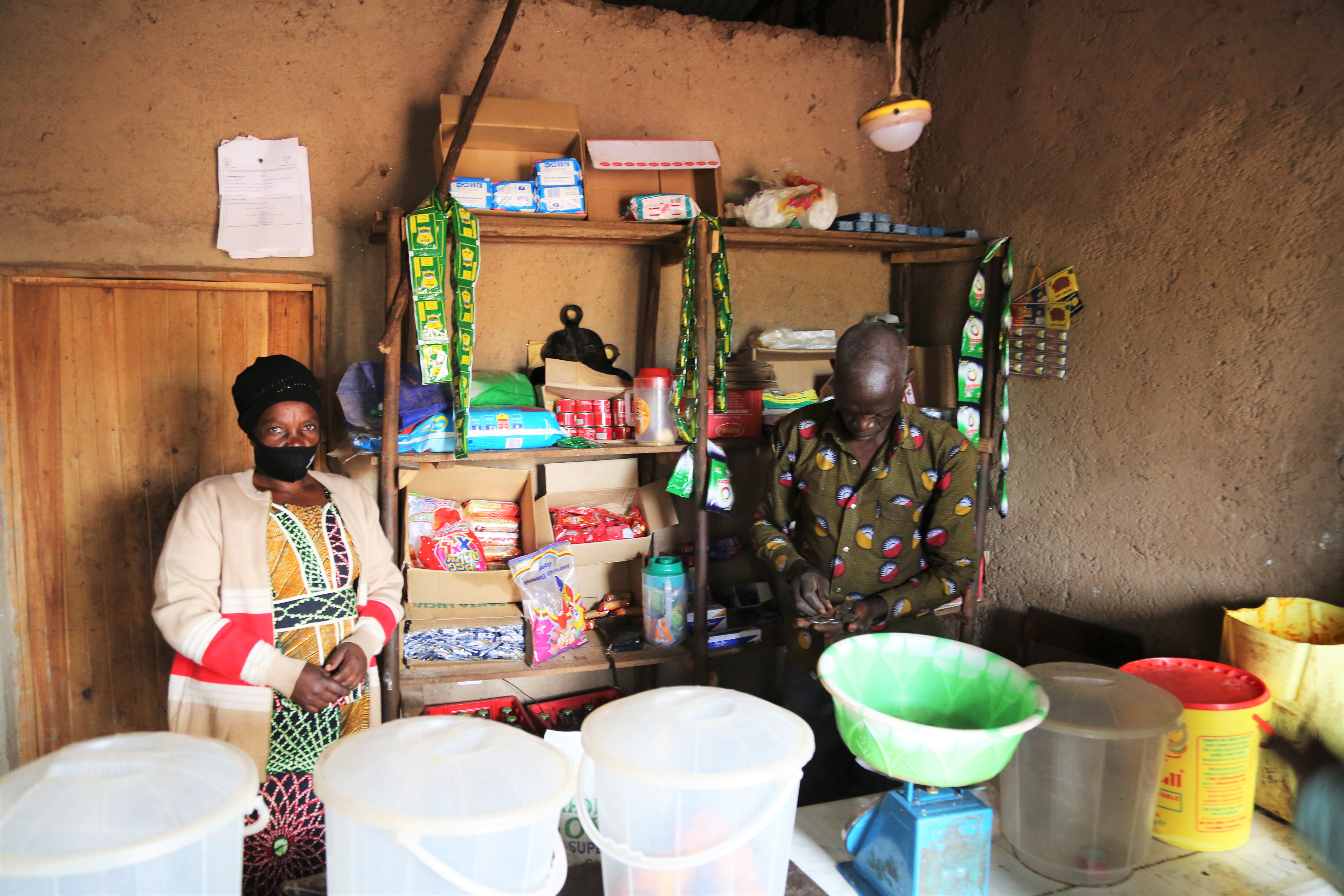 Victoire and her husband at their shop