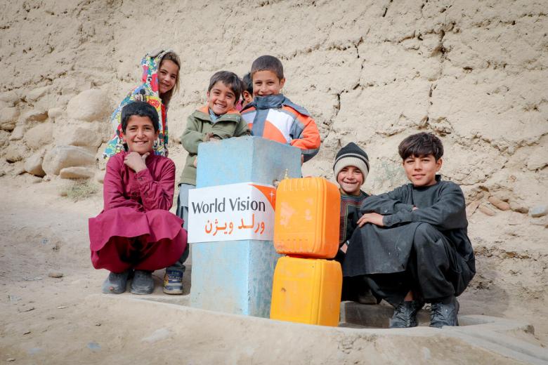 Children enjoy fresh water from solar-powered water supply network in Afghanistan