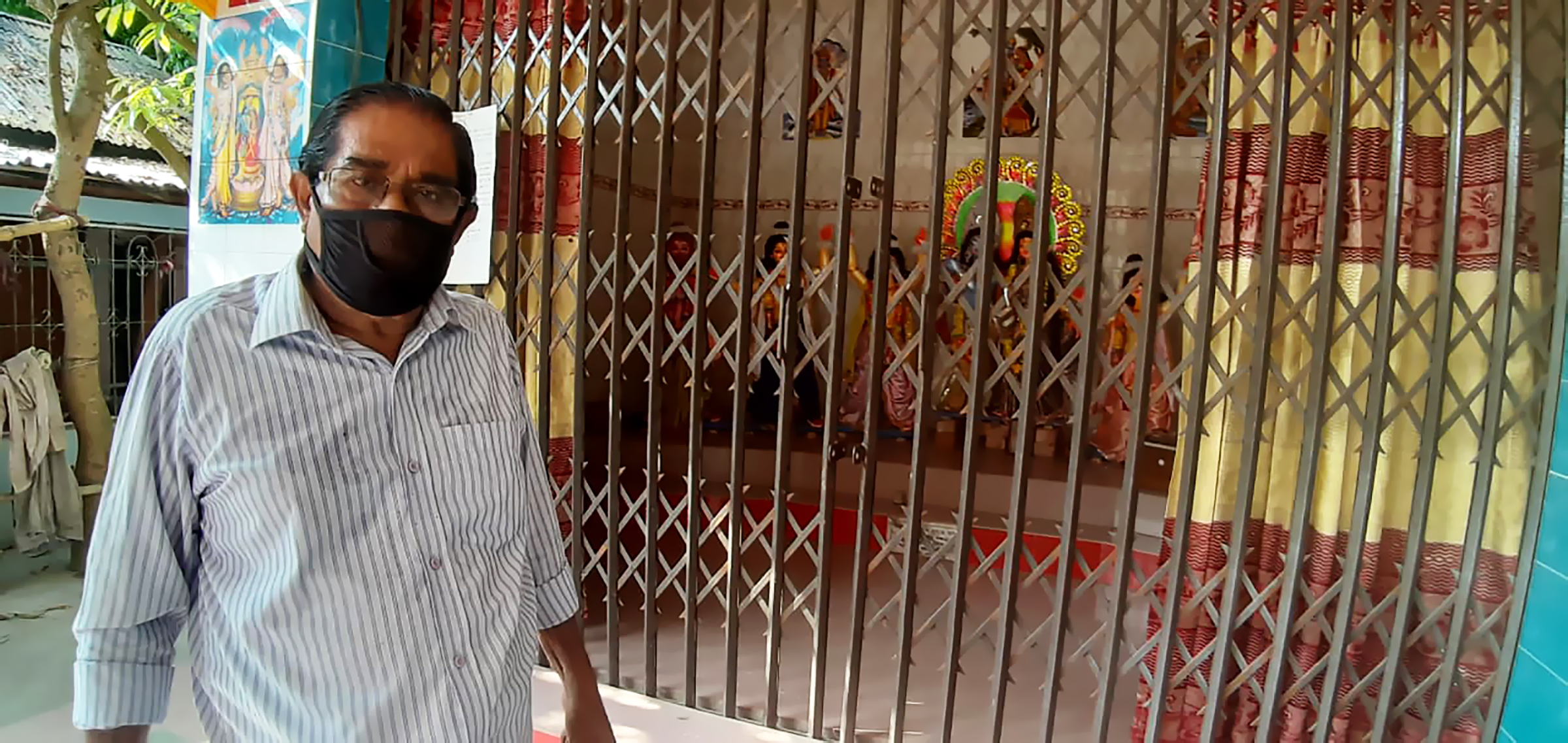 Himanshu Bikash Sarkar, President, Sri Sri Radha Gobinda Mandir, Boyra, Mymensing was standing in front of closed temple.